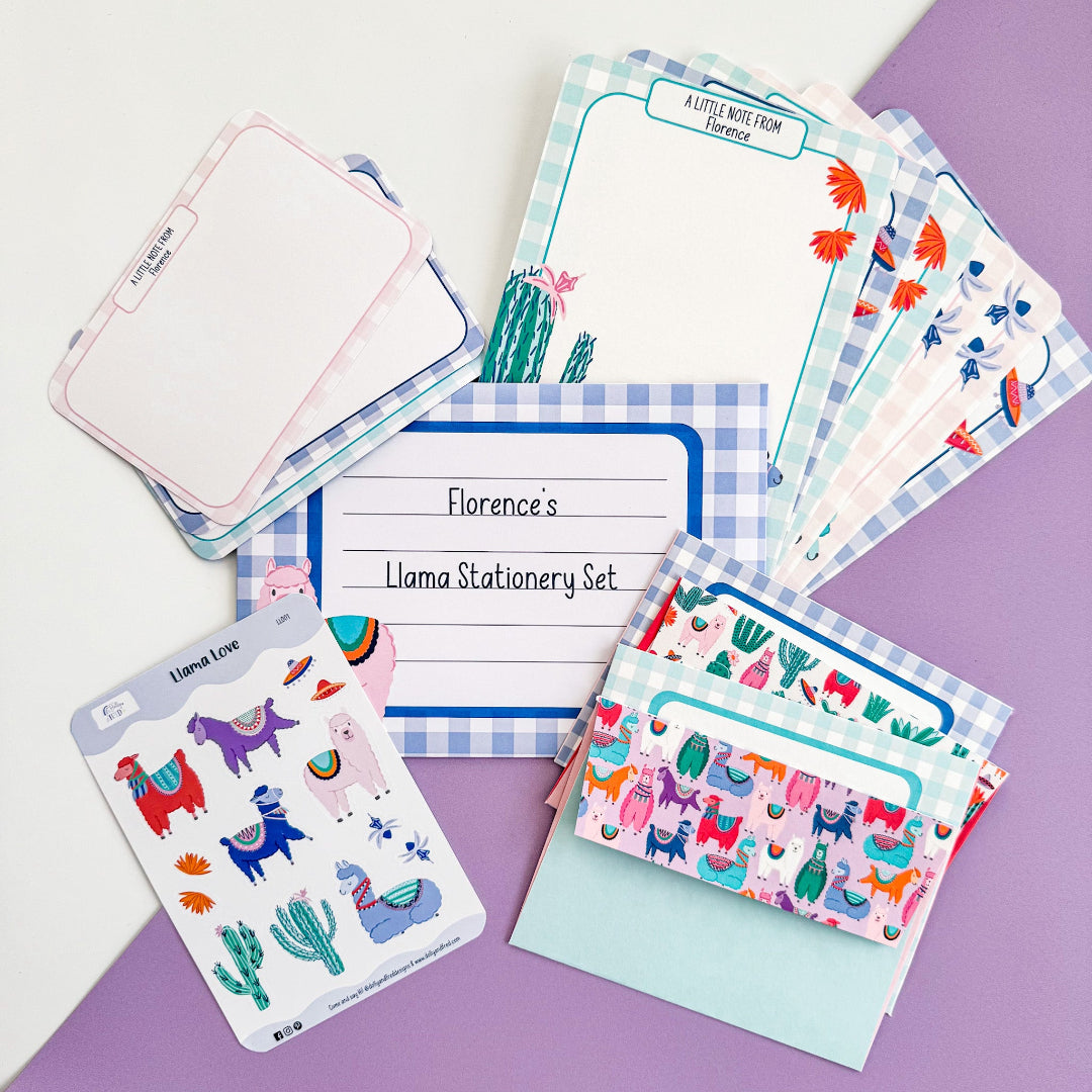 Complete contents of the Llama stationery writing set including letter paper, postcards, envelopes, and stickers