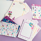 Complete mermaid stationery set featuring writing paper, postcards, envelopes, and stickers.