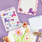 Unicorn themed sticker sheet featuring playful illustrations, included in Dolly and Fred stationery set