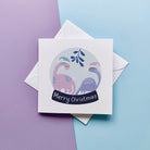 Dinosaur Snow Globe Christmas Card - Dolly and Fred Designs