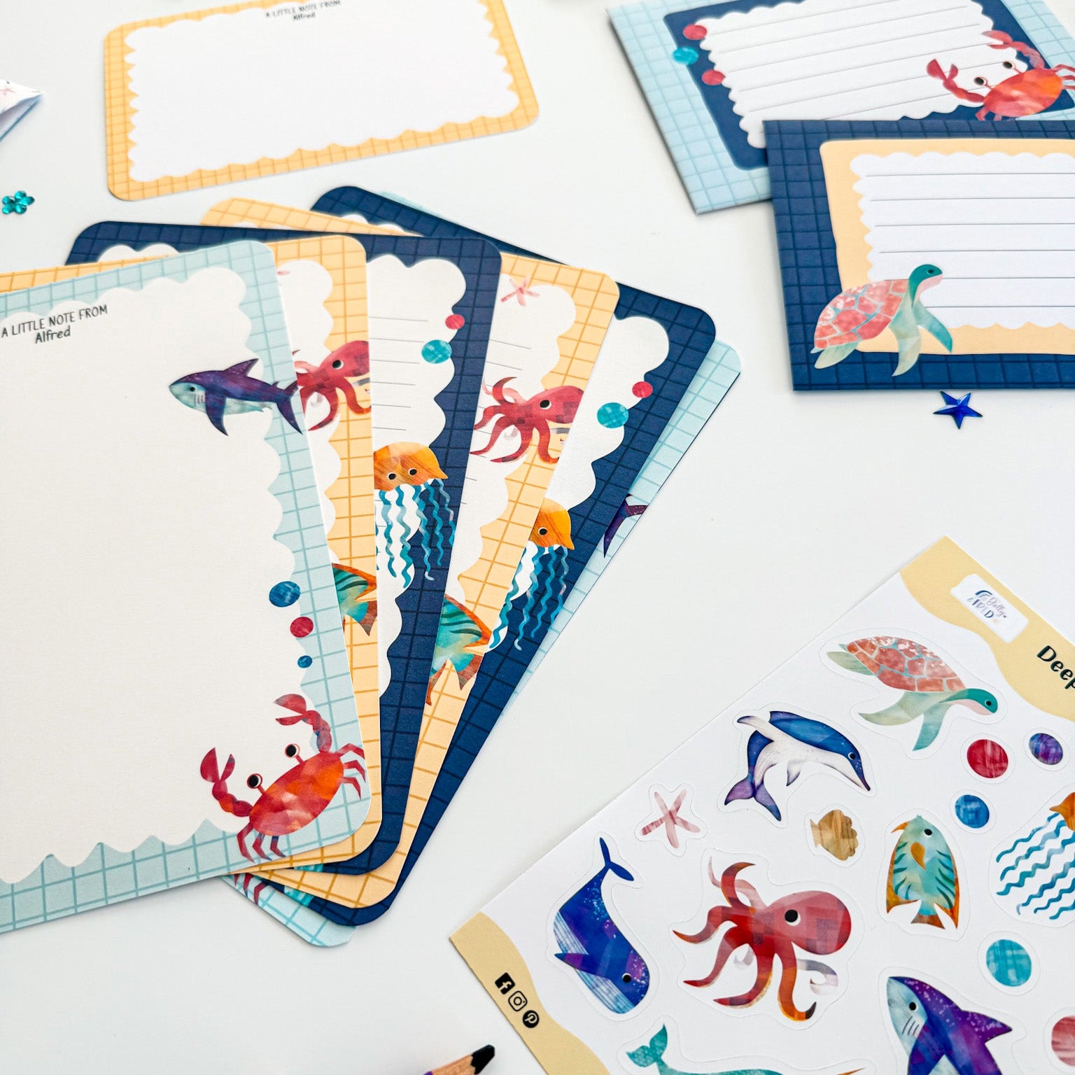 Eco-friendly kids' stationery set with an ocean theme, made from sustainable materials.