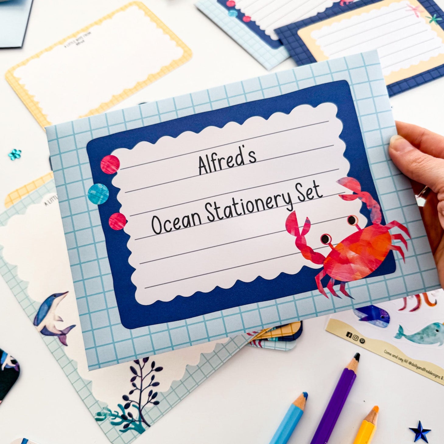 Ocean-themed letter writing set for kids with envelopes, stickers, and stationery.