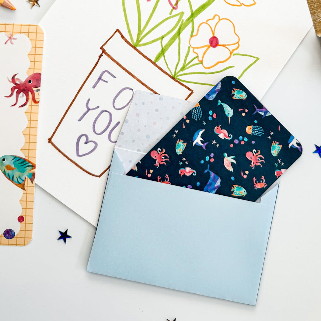 Matching under-the-sea postcards with fun ocean illustrations for kids.